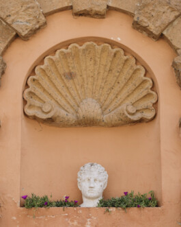wall with a statue